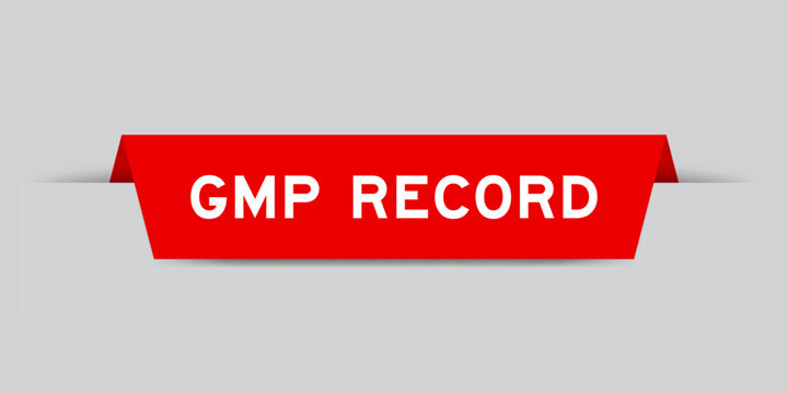 Red color inserted label with word GMP (Abbreviation of good manufacturing practice) record on gray background