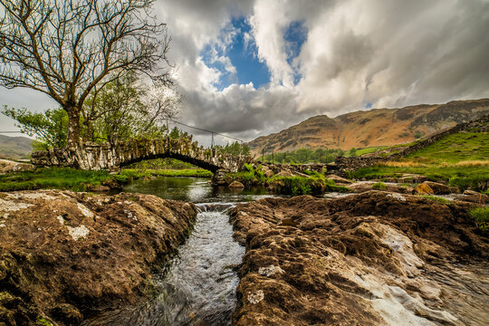 Exploring Little Langdale Valley with Slaters Bridge and River Brathay in Cumbria on a cloudy day in the Lake District