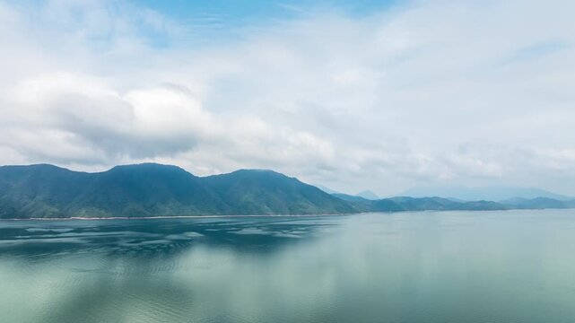 Taiping Lake Aerial Timelapse: Blue Water, Green Mountains, and Cloud Reflections