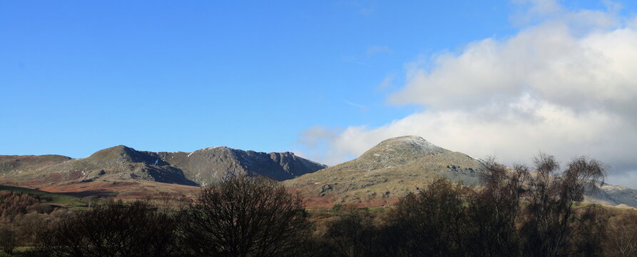 Panoramic view from Torver showing Buck Pike, Brown Pike, Dow Crag and Coniston Old Man in the English Lake District