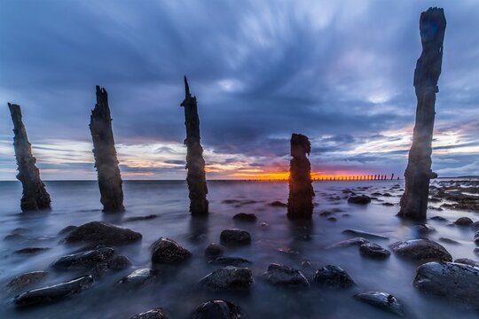 View of sunset over the Irish Sea after rain on Walney Island in the UK on 14th August 2023
