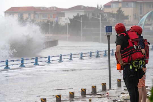 Rescue Workers Observe Rough Sea Waves At Coastal Area