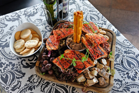 Enjoying a varied appetizer set at Don Berto restaurant in Malta by the waterfront