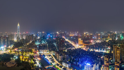 Fototapeta premium Night View of Modern Urban City with Bright Skyscrapers