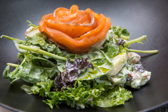 Salmon flower salad served at Miodowa restaurant in Krakow, Poland, featuring fresh greens and a unique presentation