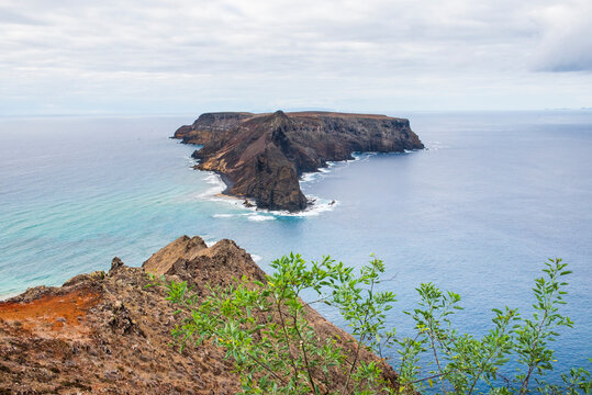 View of Cal islet from Miradouro das Flores on Calheta headland at Porto Santo Island in Madeira Portugal