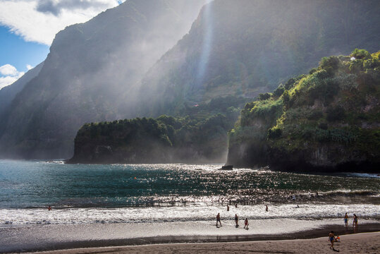 Visit to black sand beach at Seixal during afternoon light on the north-west coast of Madeira in Portugal