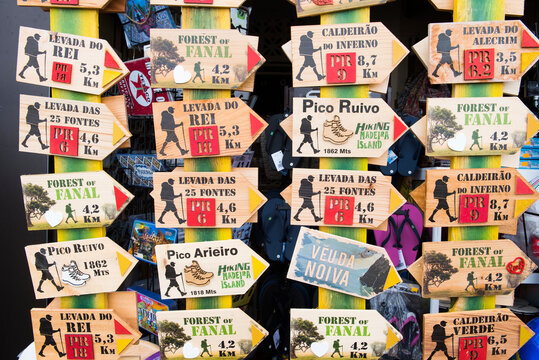 Hiking trail signs as souvenirs on the island of Madeira showcasing various routes and distances