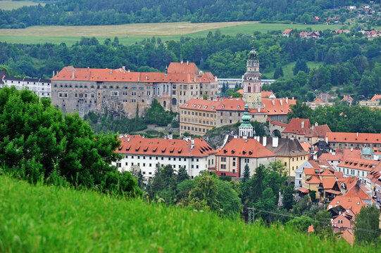 View of historic center from Mountain of the Cross near Cesky Krumlov in South Bohemia shows buildings and green landscape