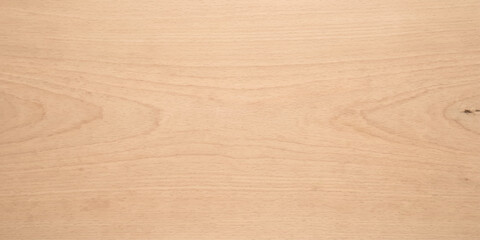 Close-up shot of light-colored wood grain with subtle patterns, showcasing natural texture and organic lines, ideal for background or design element. © RD Visuals