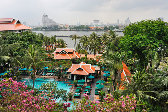 View of Bangkok Marriott Resort and Spa with river and city skyline in the background