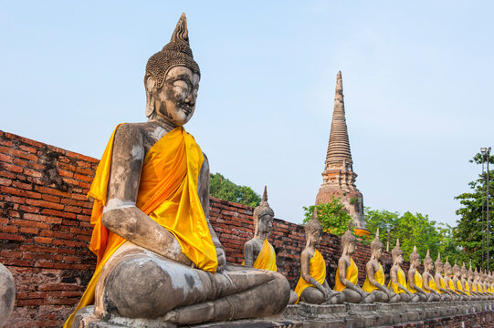 Buddha statues at Wat Yai Chai Mongkol temple in Ayutthaya, Thailand during a clear day