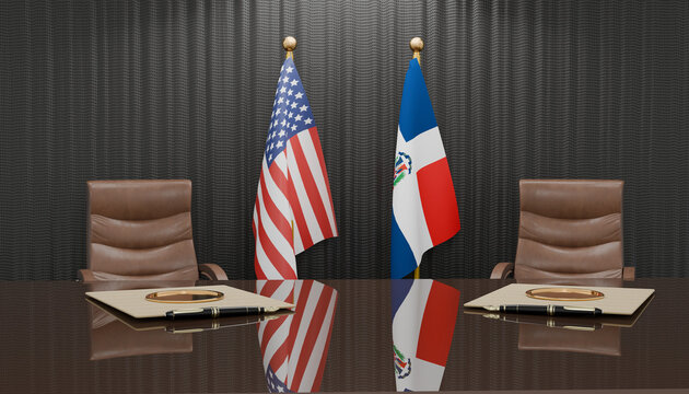 Diplomatic Accord: The flags of the United States and the Dominican Republic stand side-by-side behind a polished conference table, signifying international relations and bilateral meetings.