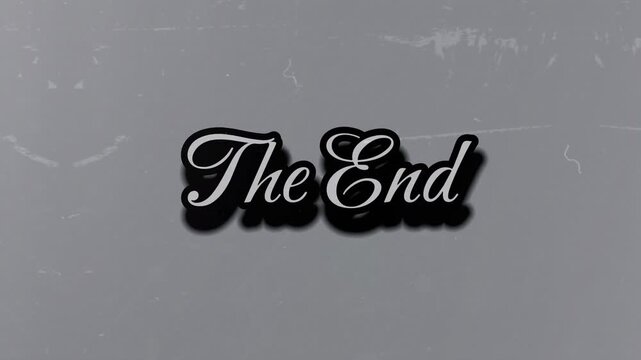 The end movie title screen with white text on black silhouette and gray gradient background