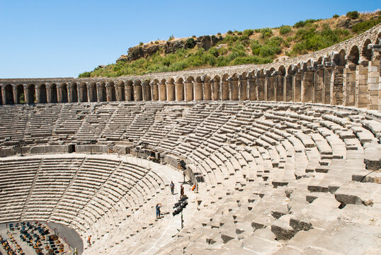 Roman theater located in the archaeological site of Aspendos shows detailed rows and ancient stonework in Antalya, Turkey