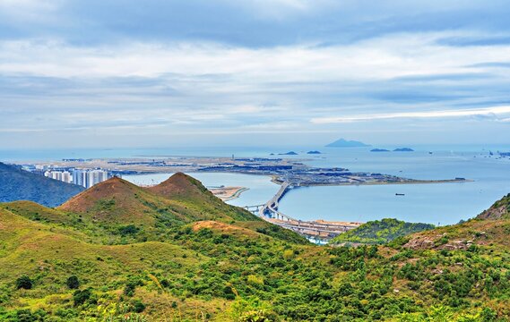 View of hong kong international airport from lo fu tau country trail on lantau island in china