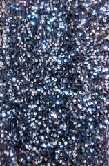 Fototapeta premium Fashionable sparkling shiny silver sequin material texture pattern background
