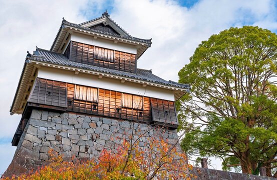 Turret of Kumamoto Castle showcases autumn colors in Kumamoto City, Kyushu, Japan