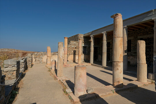 Exploring the historical ruins of the House of Mask at the Delos archaeological site in Greece
