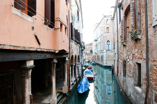 Exploring the canals and historic buildings of a unique Italian city built on islands in a lagoon during the daytime