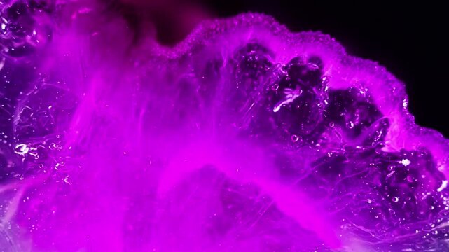  Macro vibrant purple dye slowly diffusing into thick clear agar gel, distinct boundaries, dark background