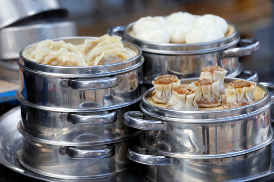 Street food at night market includes dim sum from small restaurant in Luang Prabang, Laos