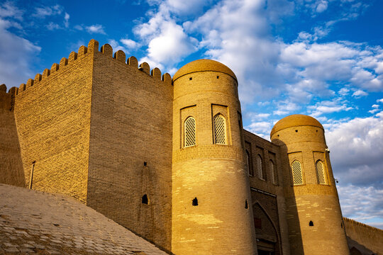 Itchan Kala wall stands tall against the sky in Khiva, showcasing ancient architecture and rich history in Uzbekistan