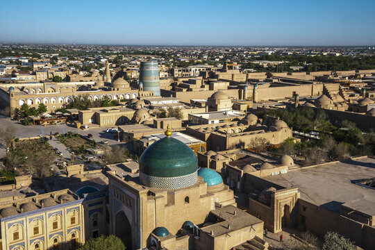 View from Islam Khodja madrasa minaret shows Itchan Kala old city in Khiva, Uzbekistan during daylight