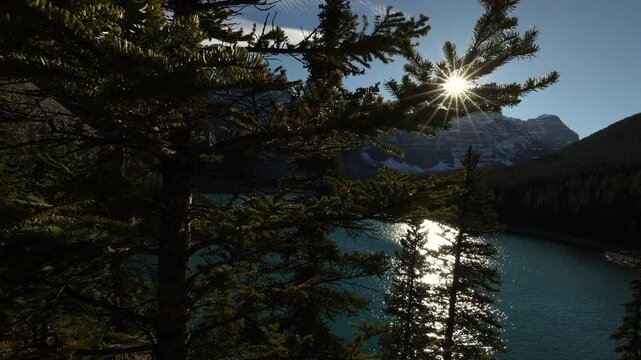 Sun shining at Moraine Lake in Canada 