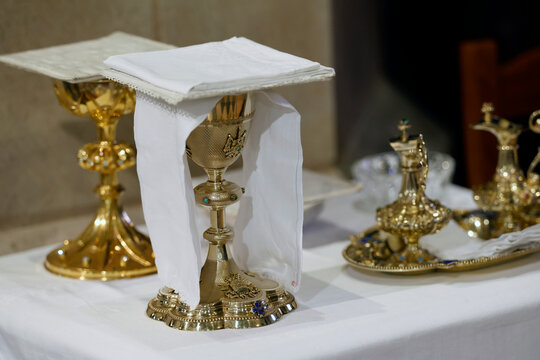 Eucharist celebration elements in Saint Nicolas church during Catholic mass in Meursault, Cote d'Or, France