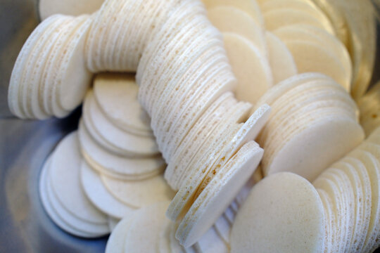 Communion wafers in bowl for Catholic Mass in La Roche sur Foron, Haute Savoie, France