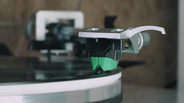 Analog vinyl playback embracing slow living and digital detox, vintage turntable with stylus above LP, mindful music ritual, retro hi-fi lifestyle, calm home atmosphere.