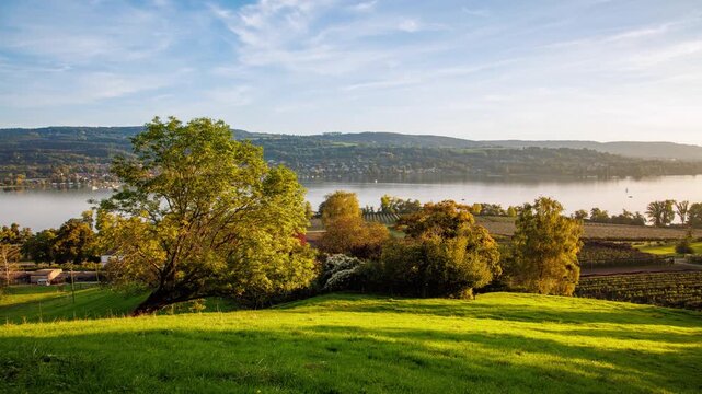 4K UHD Time Lapse of Moving Clouds Over Scenic Swiss Lake Landscape