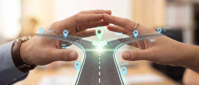 Business partnership and strategic planning concept with hands over a digital road map with location pins and handshake icon