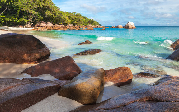 Seychelles, Anse Lazio beach on a sunny day. Coastal landscape of Praslin island