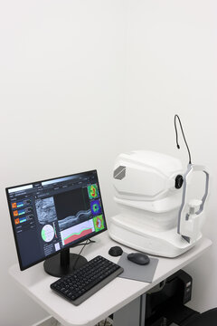 Optical coherence tomograph with monitor for detailed retinal analysis and computerized vision diagnostics.
