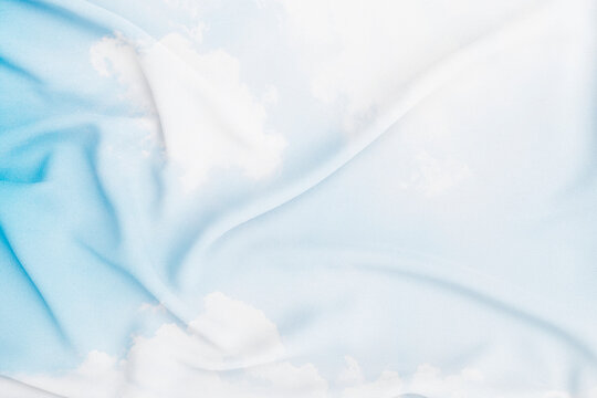 Fabric with cloud and sky pattern background, waving fabric texture