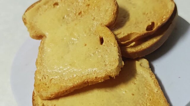 Crispy sweet butter toast close up.