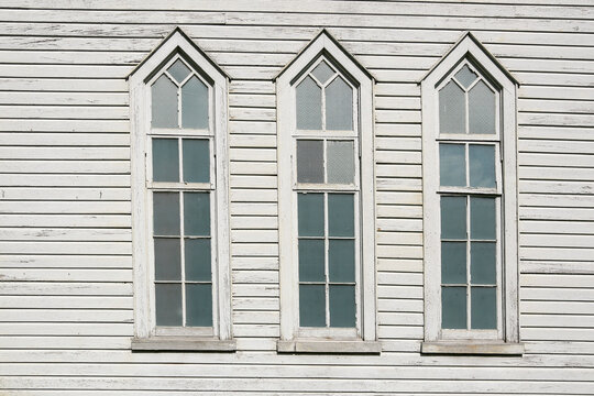 White Gothic Windows on Building Facade