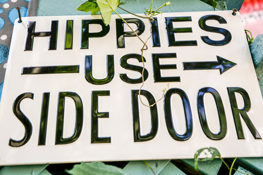 Hippies Use Side Door Sign