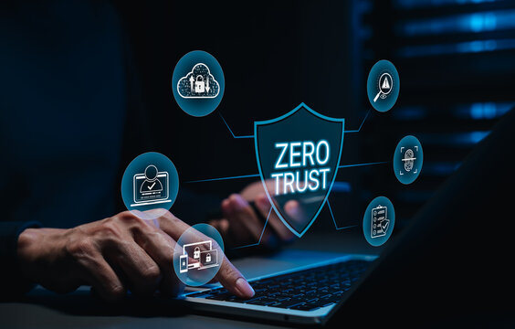Zero trust cybersecurity concept. Man using laptop with shield protection, identity access management, cloud security, fingerprint verification, secure login, threat monitoring, data privacy framework