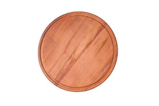 Round wooden cutting board isolated on white background.
