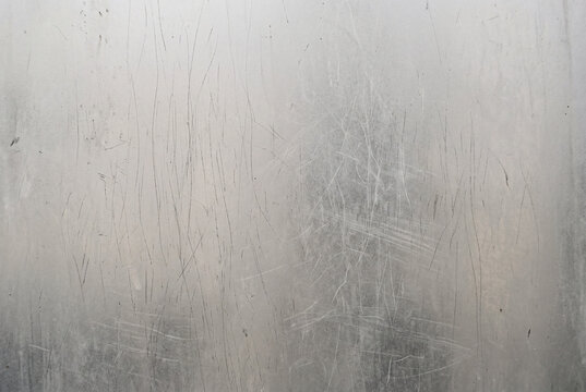 Scratches on a metal surface. Abstract background