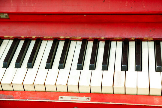 Red Piano and Keys Close Up