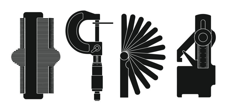 Precision measuring tools including micrometer caliper and feeler gauge set.