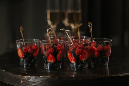 close up of a glass of red wine with a spoon