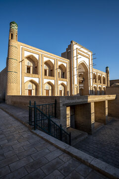 Exploring Amir Tora Madrasa in Itchan Kala with its distinct architecture and historical significance in Khiva, Uzbekistan