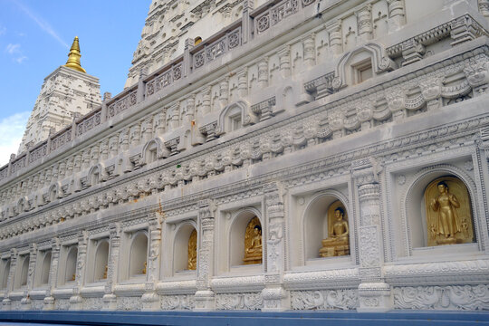 View of the Truc Lam Chanh Giac Zen Monastery in My Tho Vietnam highlighting ornate architecture and golden Buddha statues