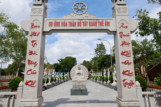 Visit to the gate of Truc Lam Phoung Nam Zen monastery along the path of statues in Can Tho Vietnam