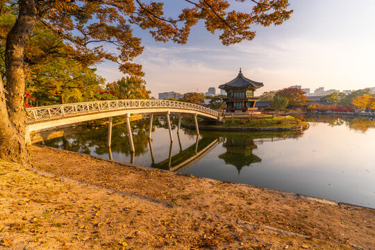 View of Hyangwonjeong Pavilion at Gyeongbokgung Palace during golden hour in autumn in Seoul, South Korea